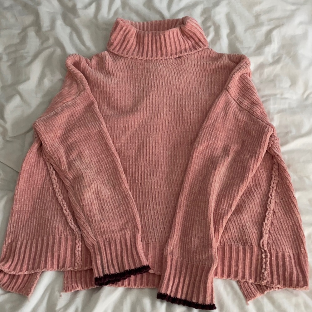 soft pink turtleneck sweater